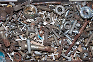 Detail of different metallic bolts and nuts.
