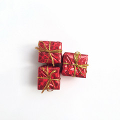 Three red gift box with gold ribbon. Mobile photography