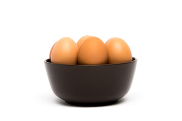 Bowl with brown farm eggs