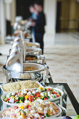 buffet table with salads