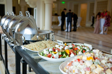 buffet table with salads