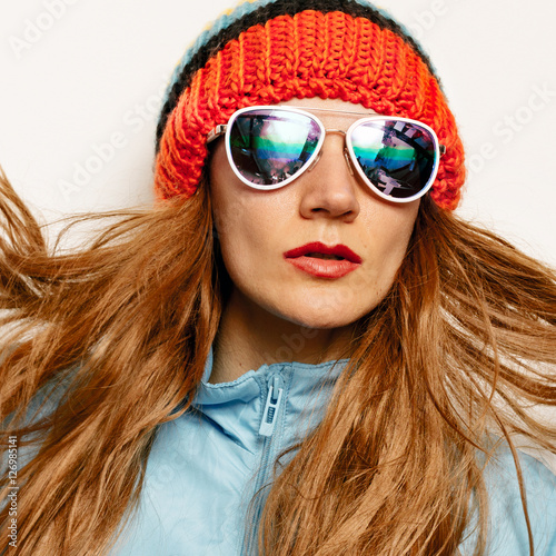 " Beanie hat and stylish sunglasses. Warm autumn winter" photo