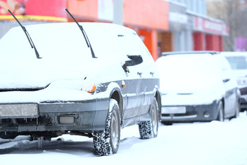 Moscow, Russia - November, 12, 2016: Cars on a parking after a snowstorm in Moscow, Russia