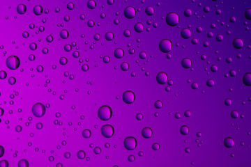 Nice purple blue color background from drops of the different size