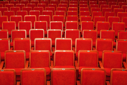 red chairs for the audience in the cinema or theater