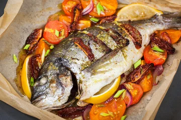Papier Peint photo autocollant Poisson Oven baked whole sea bream fish  with vegetables