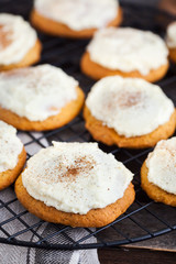 Homemade pumpkin spice cake cookies with glaze and cinnamon