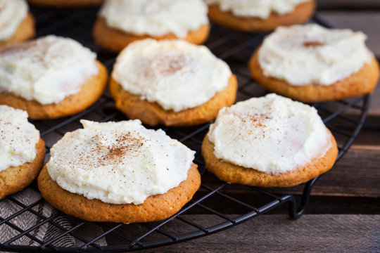 Homemade pumpkin spice cake cookies with glaze and cinnamon