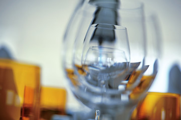 Part of a restaurant table, ready to invite somebod