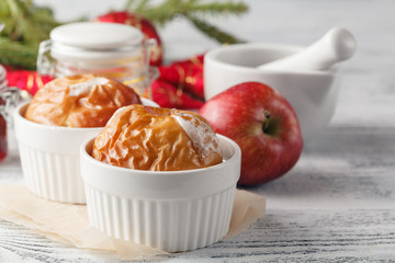 Baked apples baking in oven. Fresh apples for baking on board. C