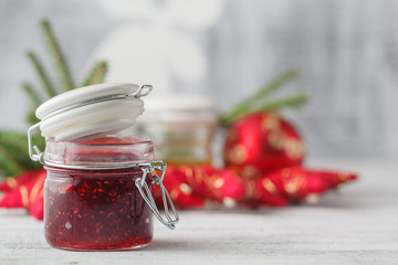 Christmas background with berries jam