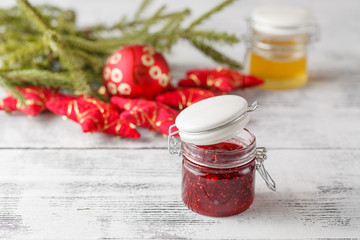 Christmas background with berries jam