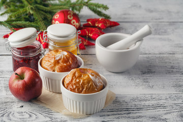 Dessert of homemade oven baked apples stuffed with cottage chees