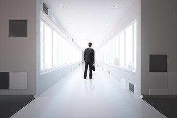 Fototapeta premium Businessman in corridor