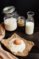 Home baking. Baking ingredients on the wooden table