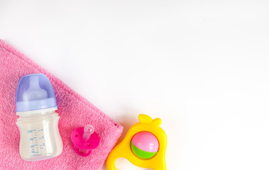 baby bottle with milk on white background top view