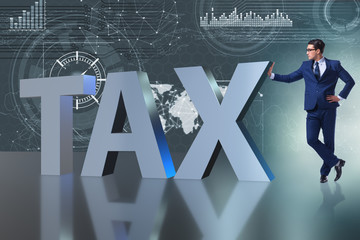 Businessman in high taxes concept