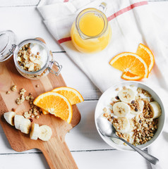 breakfast on wooden table with granola top view