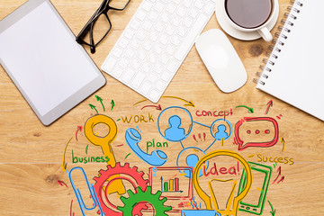 Wooden desktop with business sketch