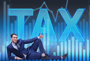 Businessman in tax burden business concept