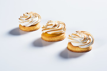 Round shortbread with cream on top