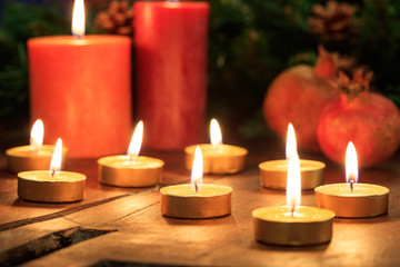 Candles and dry pomegranates