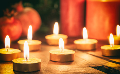 Candles and dry pomegranates