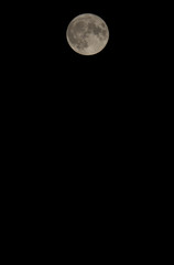 Super moon on a black sky. The moon is composed to the upper part of image.