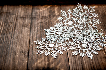Christmas decoration snowflakes rustic wooden background