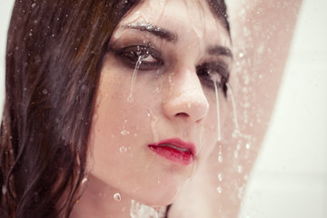 sensual girl under splash of water with fresh skin