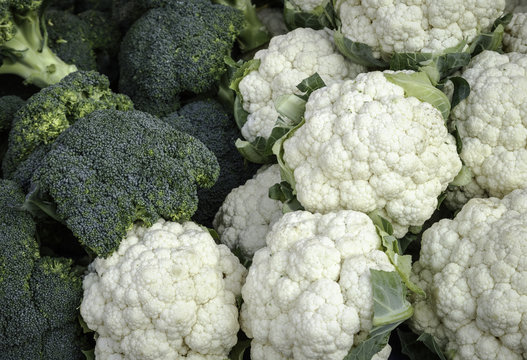 Market display of broccoli and cauliflower