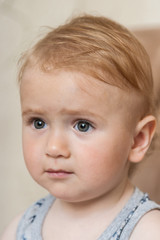 Portrait of a cute, charming kid looking forward