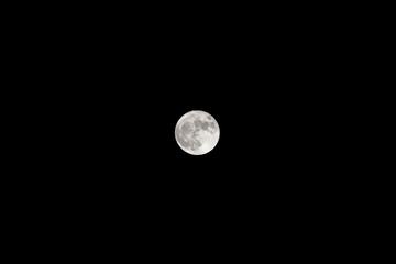 view of the full moon in the night sky © sergiy1975