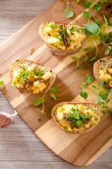 Scrambled eggs on toast with herbs