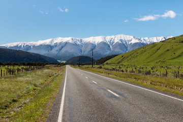 Fototapeta na wymiar country road in Southern Alps in New Zealand