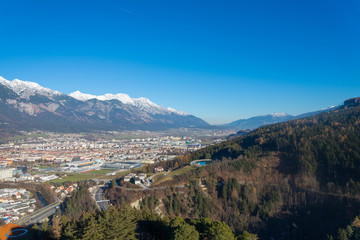 Fototapeta na wymiar Panorama view from top of the Alp range in Innsbruck, Austria