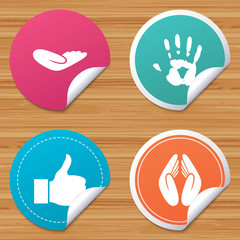 Fototapeta premium Round stickers or website banners. Hand icons. Like thumb up symbol. Insurance protection sign. Human helping donation hand. Prayer hands. Circle badges with bended corner. Vector