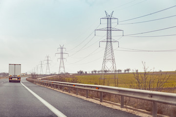 Power lines next to the road