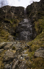 Water Trickling Down Wall of Cliff