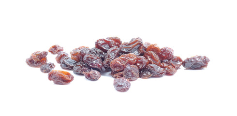 Dried grapes on white background.