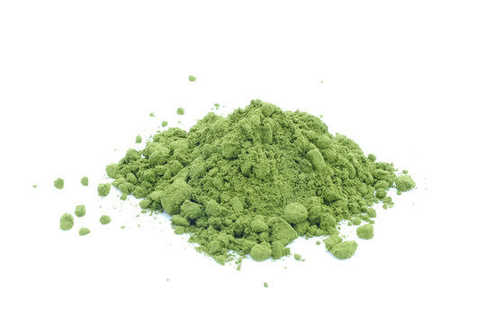 Green tea powder on white background.