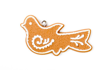 Christmas tree decors -dove. Gingerbread bird’s - pigeon’s figure,  snow. Sugar frosted cookies. Christmas decorations. Isolated on white background.