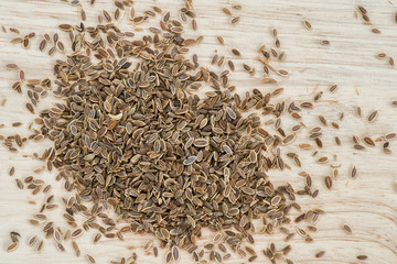 Prepraretion dill seed on plank