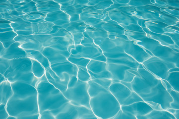 Fototapeta na wymiar Ripple water in swimming pool