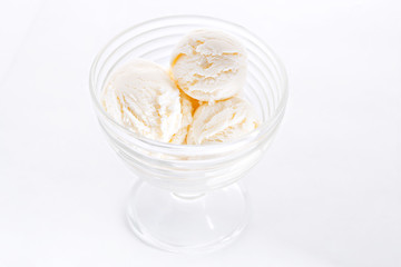 Vanilla sundae ice cream in cup on white background