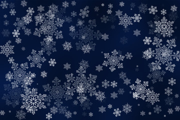 White snowflakes on an abstract deep blue background