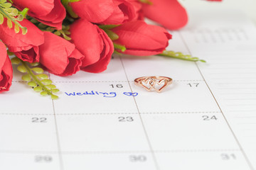 Wedding note on a calendar sets a reminder for the wedding