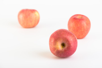 Fresh red apples on white background