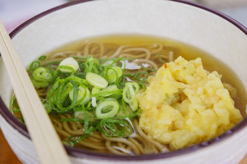 Delicious Fry Tempura served with green onions and noodles