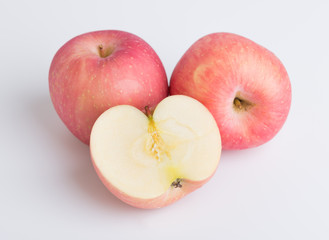 Fresh red apples on white background